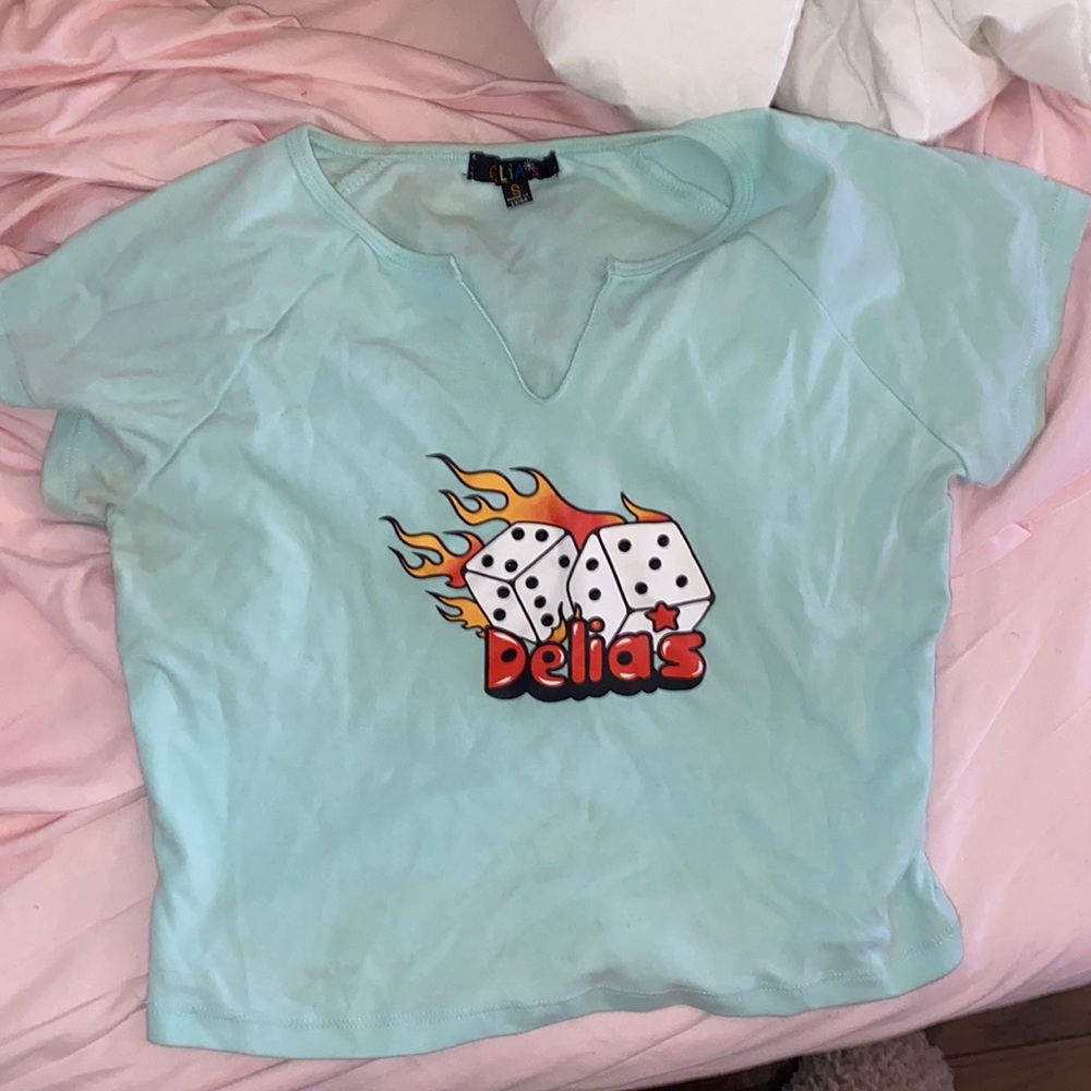 Delia’s blue cropped top. Dice design.  size small